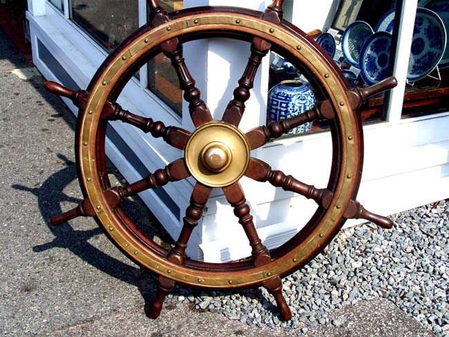 A good 19th century Eight Spoked Ship's Wheel with Brass Hub and Rim circa 1870